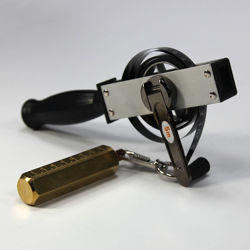 Oilfield gauge tape with plumb bob